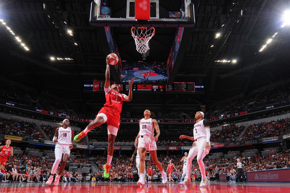 NaLyssa Smith of the Fever scores a layup during the game.