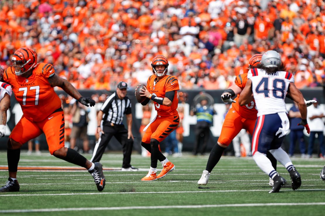 CINCINNATI, OH - SEPTEMBER 08: Cincinnati Bengals quarterback Joe Burrow (9) looks to pass during the game against the New England Patriots and the Cincinnati Bengals on September 8, 2024, at Paycor Stadium in Cincinnati, OH. (Photo by Ian Johnson/Icon Sportswire via Getty Images)