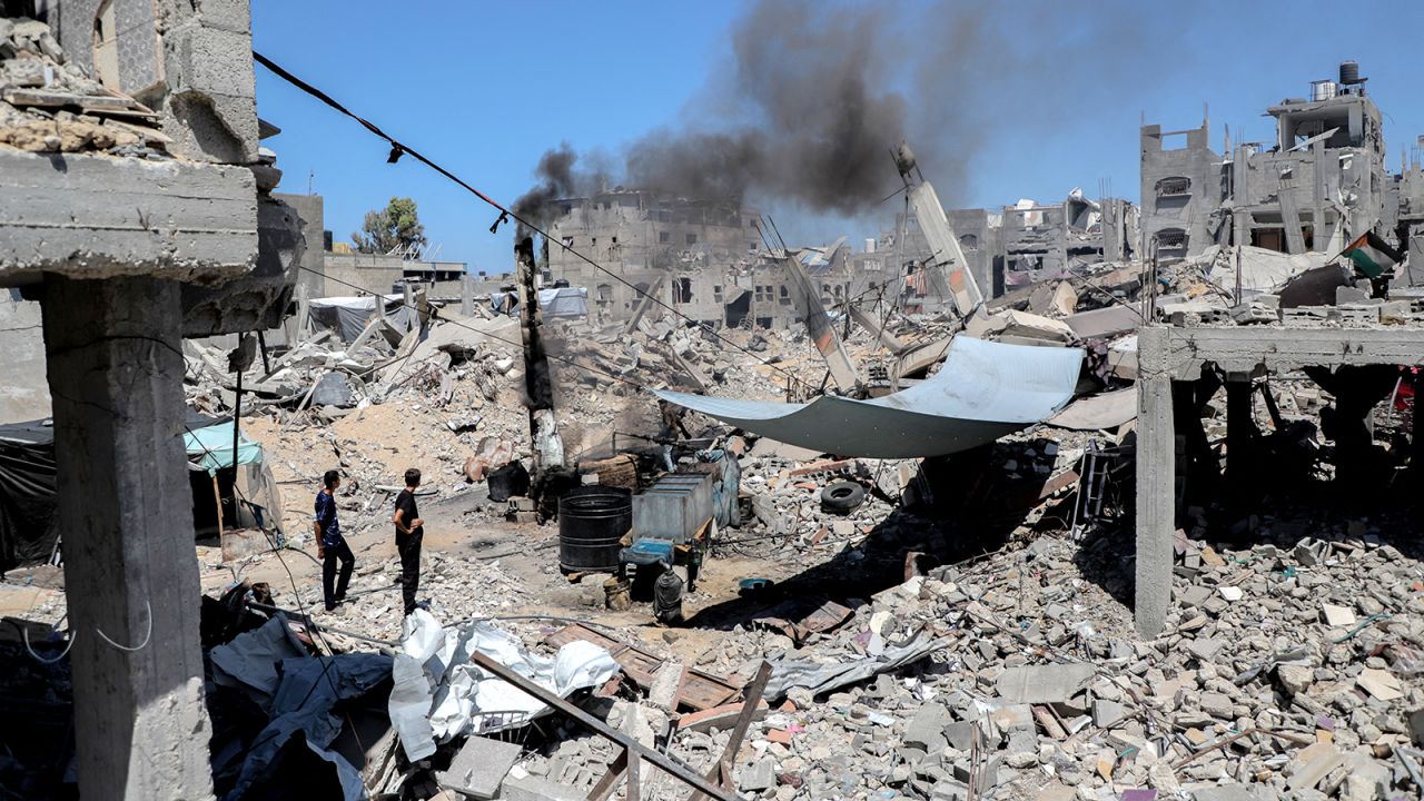 Palestinian men convert plastic into liquid fuel in the Jabalya camp in northern Gaza on September 5.