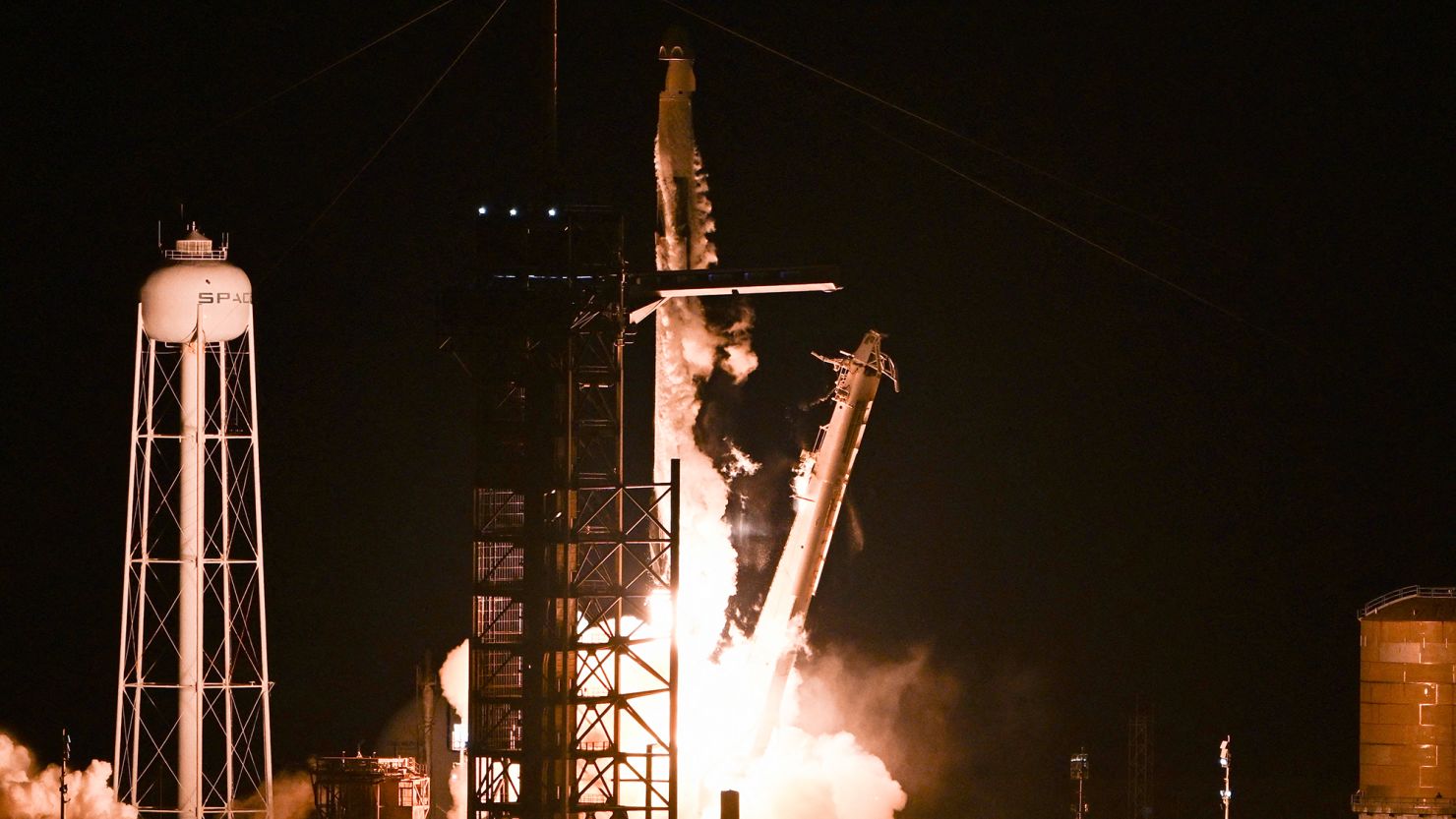 A SpaceX Falcon 9 rocket with the Crew Dragon Resilience capsule, carrying the crew of the Polaris Dawn Mission, lifts off from the Kennedy Space Center in Cape Canaveral, Florida.