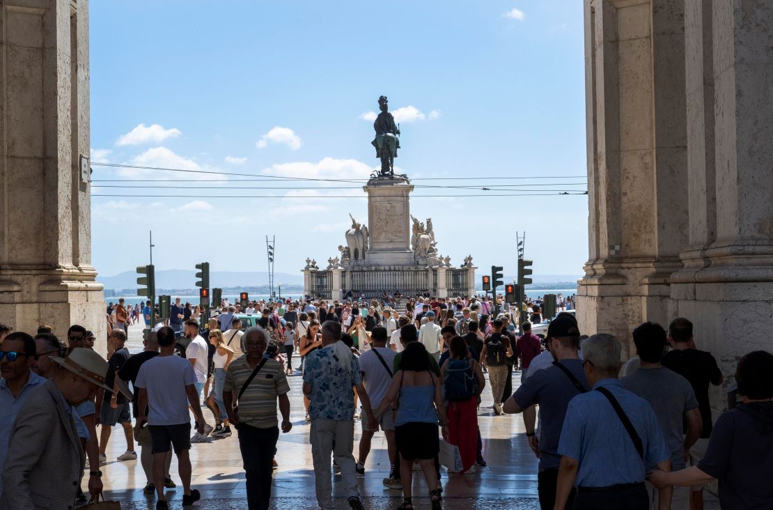 Some Lisbon locals say they've been priced out by tourist lets. Pictured here: the Augusta Arch near Comercio square, in the Baixa district of Lisbon.