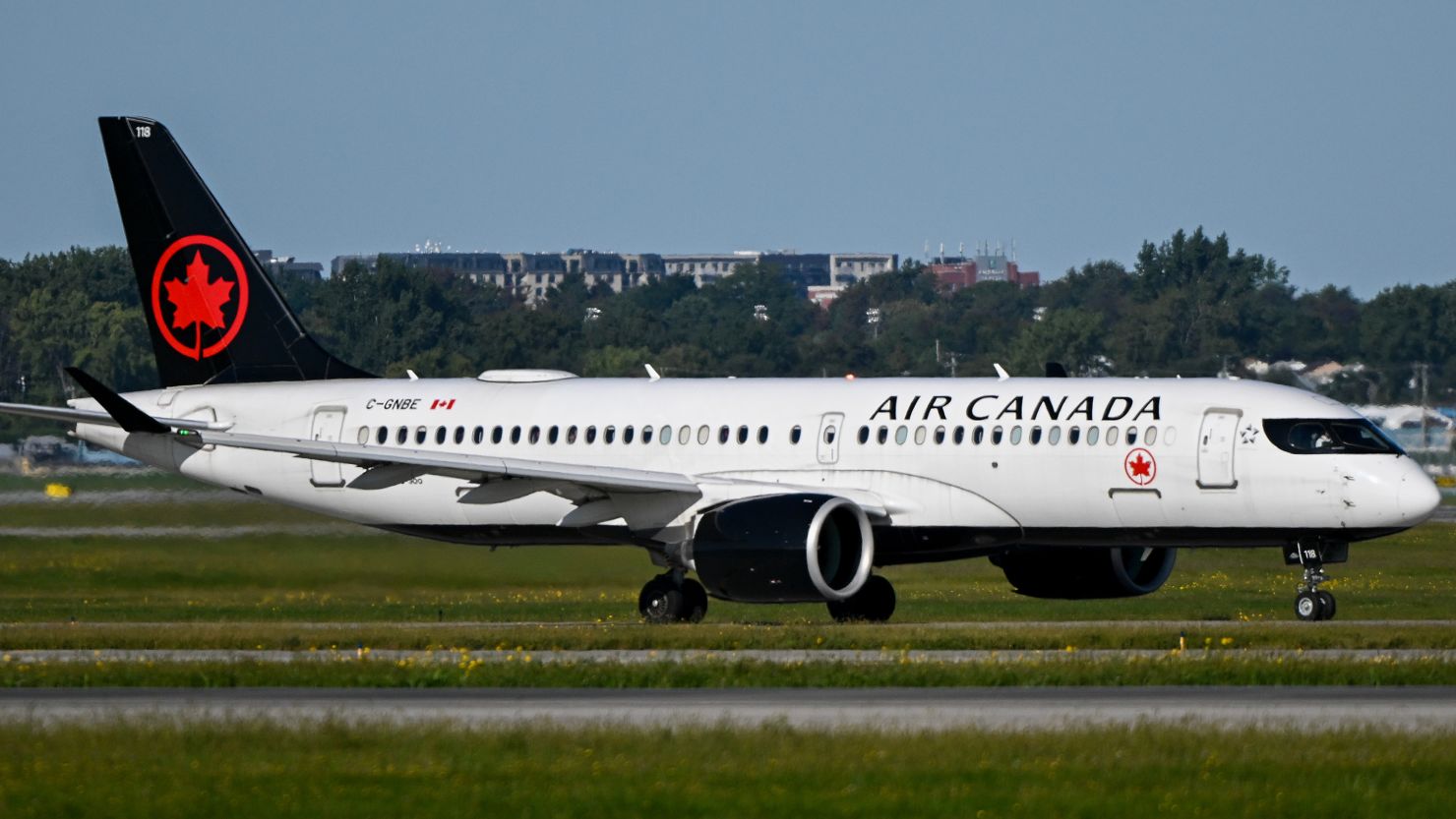 An Air Canada aircraft at Montreal-Pierre Elliott Trudeau International Airport (YUL) in Montreal, Quebec, Canada, on Tuesday, Sept. 10, 2024. Air Canada, Canada's largest airline, says it's making plans to suspend flights beginning on Sept. 15 if a new contract is not reached with the union representing more than 5,000 pilots. Photographer: Graham Hughes/Bloomberg via Getty Images