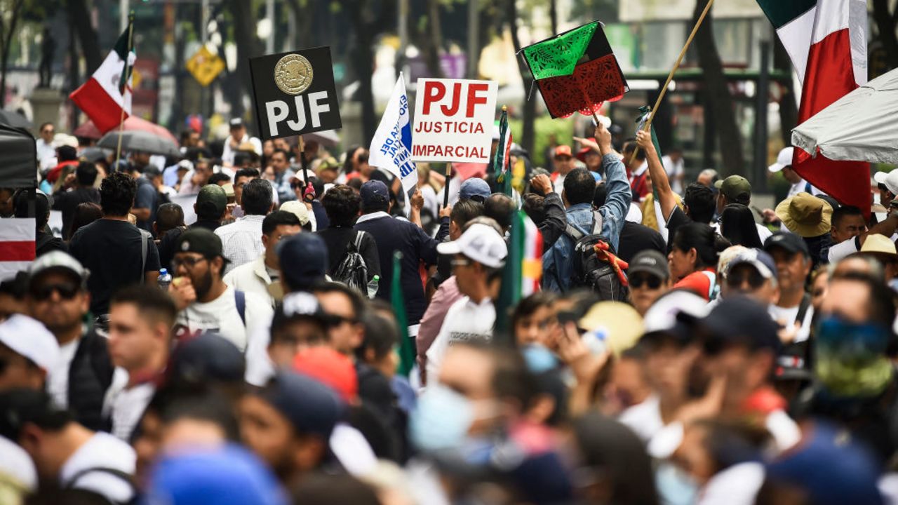 Employees of the judiciary take part in a protest against the judicial reform proposed by the government in Mexico City on September 10, 2024. Mexican President Andres Manuel Lopez Obrador's controversial reform, which proposes the popular election of judges and magistrates, began its final stage in the Senate on Tuesday amid protests, tensions with the United States, and economic nervousness. (Photo by Rodrigo Oropeza / AFP) (Photo by RODRIGO OROPEZA/AFP via Getty Images)