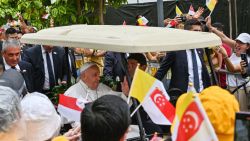 Pope Francis waves to Catholic faithful as he arrives at Changi Jurassic Mile in Singapore on September 11, 2024. Pope Francis touched down in Singapore on September 11, the last stop of a four-nation Asia-Pacific trip. (Photo by Roslan RAHMAN / AFP) (Photo by ROSLAN RAHMAN/AFP via Getty Images)