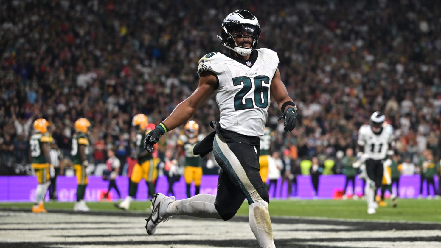 Philadelphia Eagles running back Saquon Barkley celebrates after a touchdown during the second quarter against the Green Bay Packers.