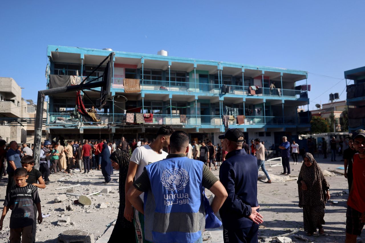 A member of UNRWA checks the courtyard of a school after an Israeli air strike hit the site, in Nuseirat, Gaza, on September 11.