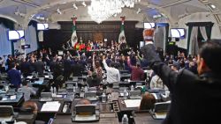 Members of Mexico's Senate celebrate after they passed the controversial judicial reform at the Senate's chamber in Mexico City on September 11, 2024. Mexico became the world's first country to allow voters to elect judges at all levels on Wednesday, after protesters invaded the upper house and suspended debate on the issue. (Photo by Cesar Sanchez / AFP) (Photo by CESAR SANCHEZ/AFP via Getty Images)