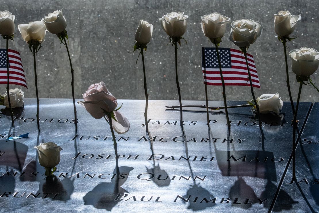 Decorations are left behind on the panel of names at the 9/11 memorial site in New York on September 11, 2024.