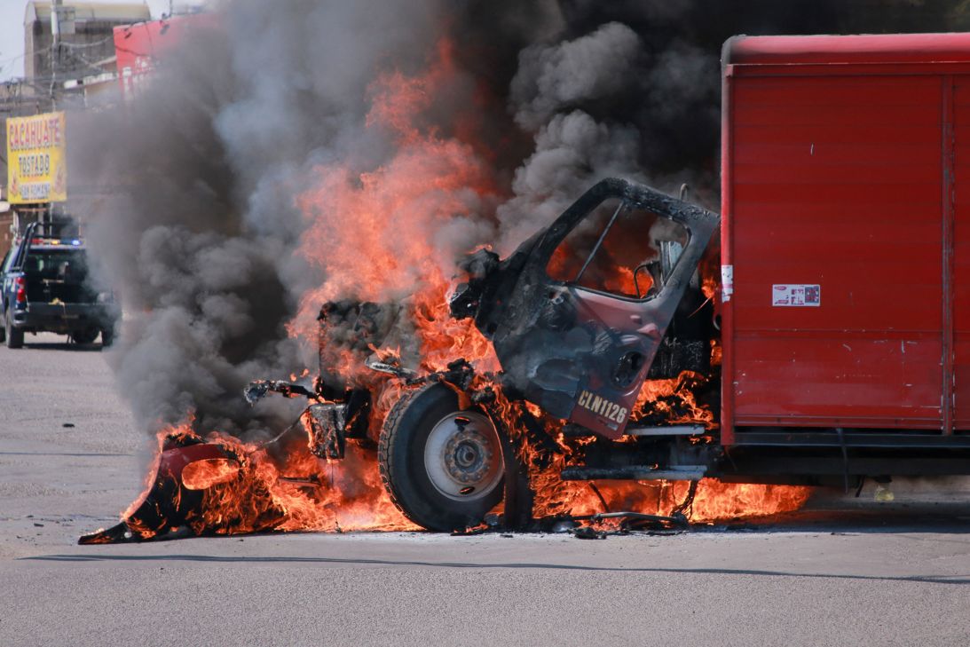 A truck on fire on the streets of Culiacan, Sinaloa state, in September 2024. Elements of Mexico's National Guard were deployed amid an escalation of violence that authorities attribute to internal struggles within the Sinaloa cartel following the capture of its leader, Ismael 