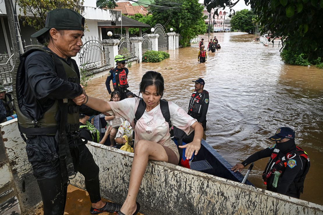 Rescue teams pick up schoolchildren and residents in Chiang Rai, Thailand on September 12, 2024.