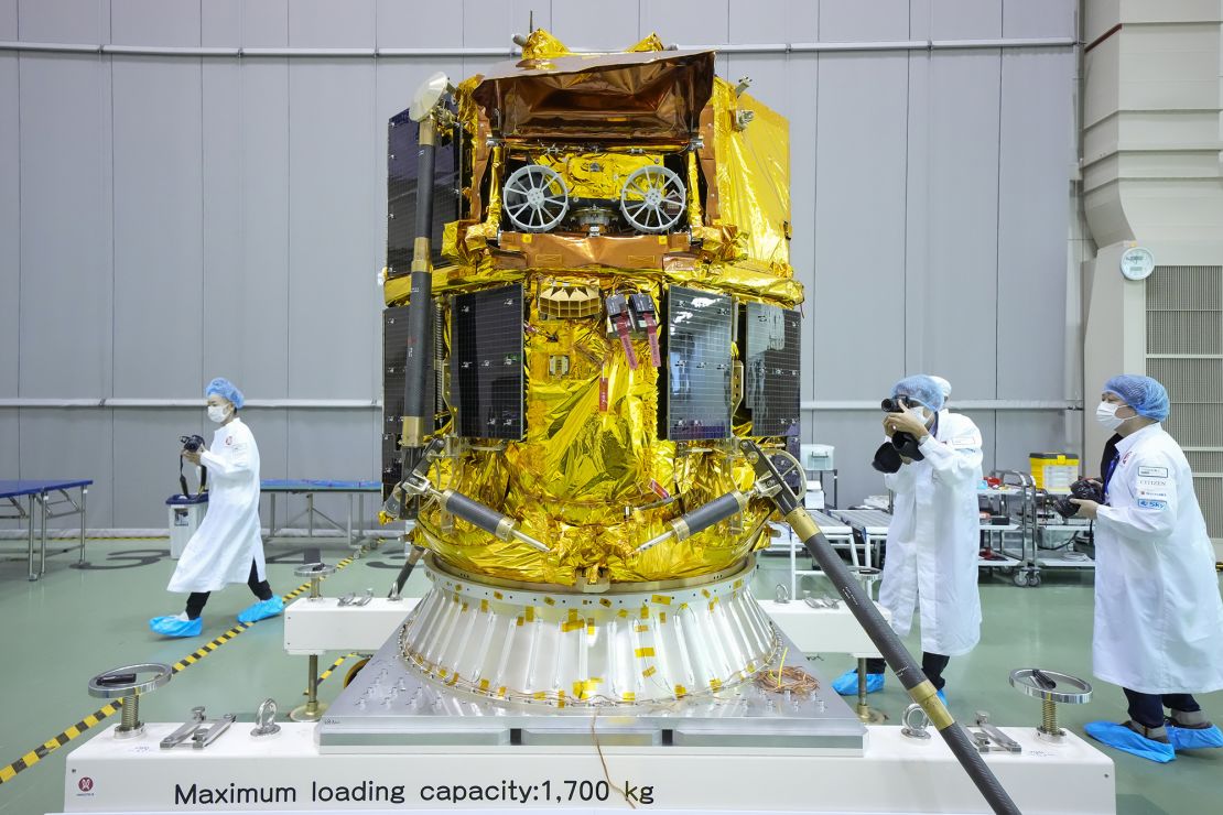 The Ispace Tenacious rover (top) is seen carried by the Resilience lunar lander at the Japan Aerospace Exploration Agency's Tsukuba Space Center in September 2024.