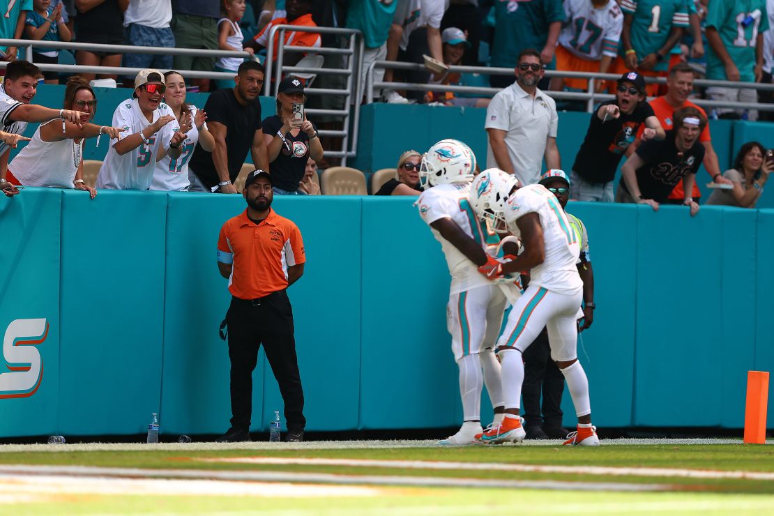 Tyreek Hill and Jaylen Waddle celebrate Hill's third-quarter touchdown against the Jacksonville Jaguars.