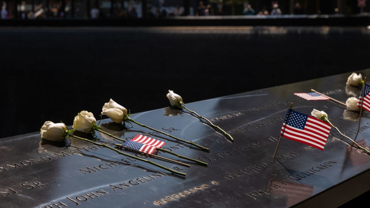 NEW YORK, NEW YORK - SEPTEMBER 09: Flowers are left at the September 11 Memorial and Museum, which is located on the land where the Twin Towers once stood before they were destroyed in the attacks on September 11, 2001, on September 09, 2024, in New York City. New York City and the nation are preparing to mark the 23rd anniversary of the attacks, which killed nearly 3000 people and injured thousands more.  (Photo by Spencer Platt/Getty Images)