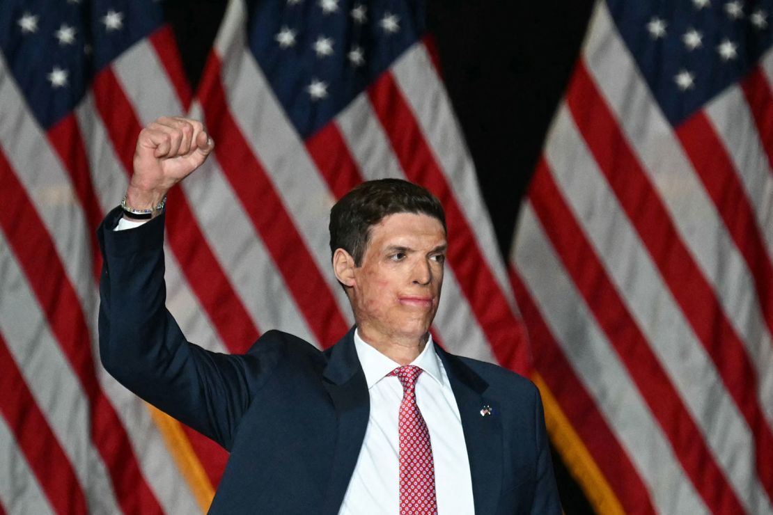 Republican US Senate candidate Sam Brown arrives on stage at the start of a campaign rally with former President Donald Trump in Las Vegas, Nevada, on September 13, 2024.