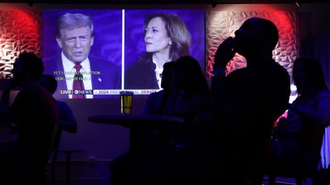 People watch the ABC presidential debate during a watch party at Penn Social on Sep. 10, 2024 in Washington, DC.