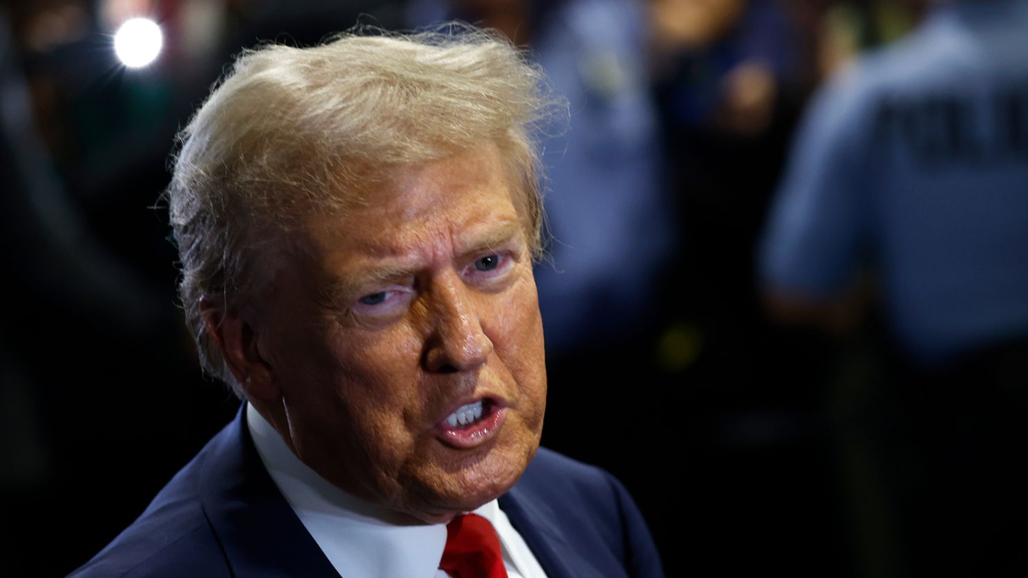 Republican presidential nominee, former U.S. President Donald Trump speaks to reporters in the spin room after debating Democratic presidential nominee, U.S. Vice President Kamala Harris.