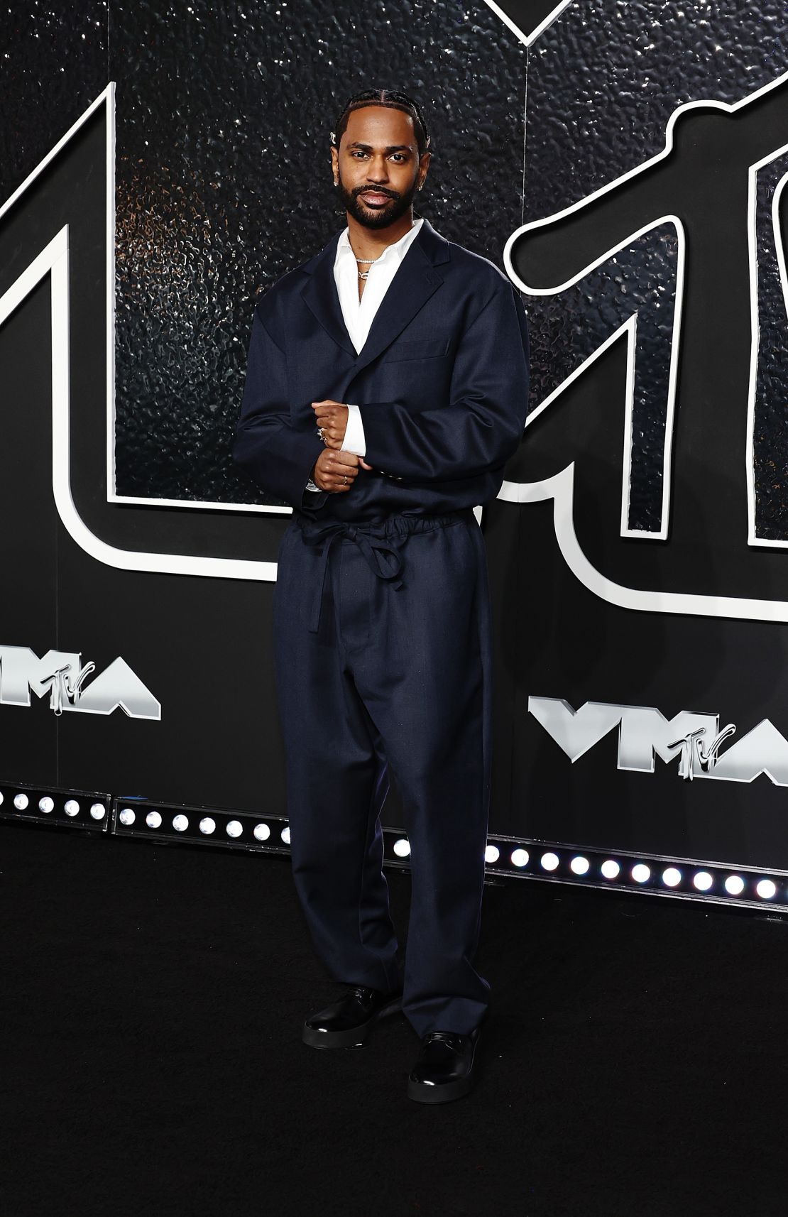 Big Sean looked suave in a loose-fitting dark suit.