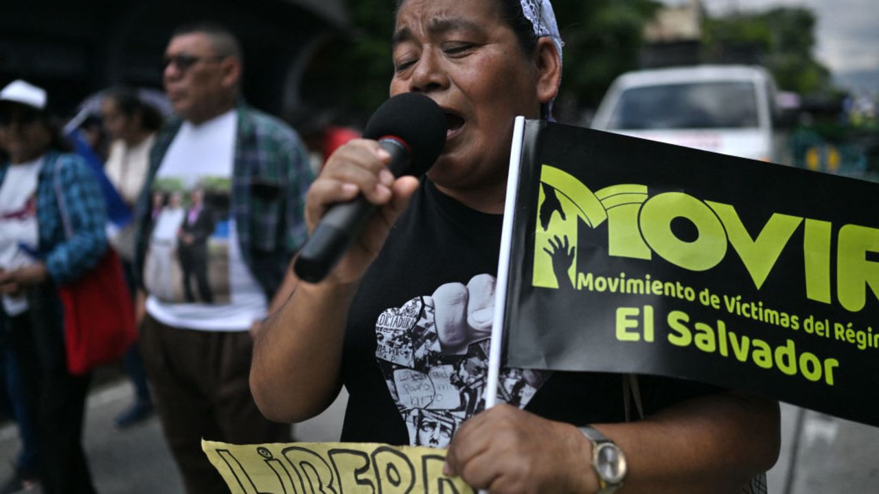 A demonstrator takes part in a protest to demand the release of thousands of detainees by the government of Nayib Bukele in San Salvador on September 15, 2024. More than a thousand people marched this Sunday in El Salvador to demand the release of thousands of detainees they consider "innocent victims" in the "war" against gangs launched since 2022 by President Nayib Bukele. (Photo by Daniela RODRIGUEZ / AFP) (Photo by DANIELA RODRIGUEZ/AFP via Getty Images)