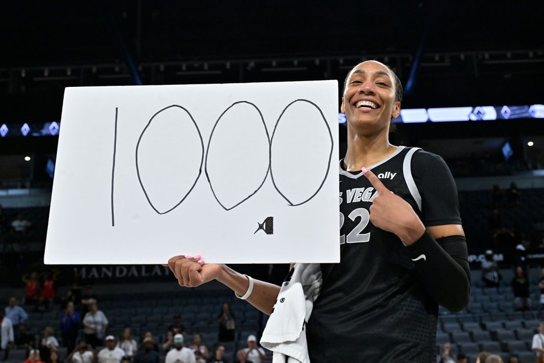 A'ja Wilson #22 of the Las Vegas Aces celebrates after becoming the first WNBA player to score 1,000 points in a single season during a game against the Connecticut Sun on September 15, 2024 at Michelob ULTRA Arena in Las Vegas, Nevada.