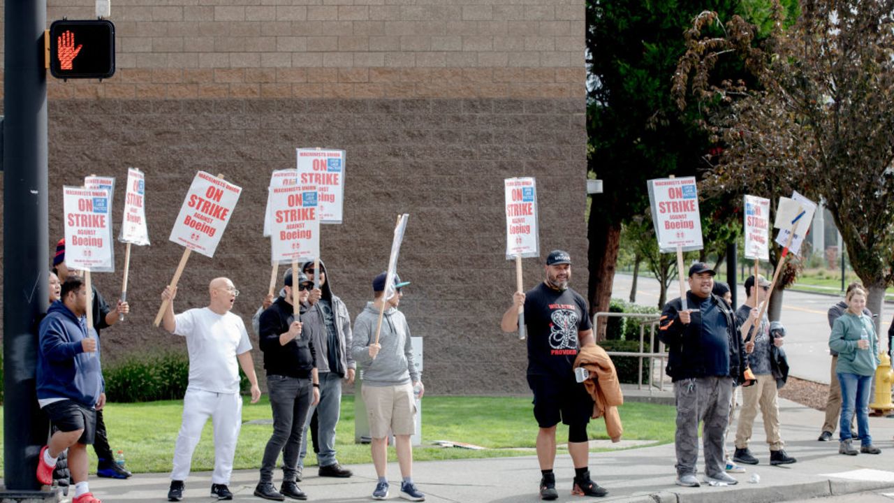 Striking Boeing workers and their supporters picket outside the Boeing Co. manufacturing facility in Renton, Washington on September 16, 2024. In the first strike in 16 years, thousands of Boeing factory workers walked off the job in a dispute of pay that is likely to effect the manufacture of Boeing commercial planes. (Photo by Yehyun Kim / AFP) (Photo by YEHYUN KIM/AFP via Getty Images)