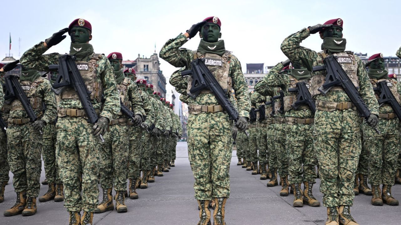 Security forces stand to attention before inspection by Mexican President Andres Manuel Lopez Obrador on the day of a military parade for the 214th anniversary of Independence Day at the Zocalo Square in Mexico City on September 16, 2024. (Photo by CARL DE SOUZA / AFP) (Photo by CARL DE SOUZA/AFP via Getty Images)