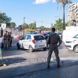 Lebanese army soldiers block an entrance of a Beirut southern suburb on September 17, 2024, after explosions hit locations in several Hezbollah strongholds around the country amid ongoing cross-border tensions between Israel and Hezbollah fighters. Hundreds of people were wounded when Hezbollah members' paging devices exploded simultaneously across Lebanon on September 17, in what a source close to the militant movement said was an "Israeli breach" of its communications. (Photo by Ibrahim AMRO / AFP) (Photo by IBRAHIM AMRO/AFP via Getty Images)