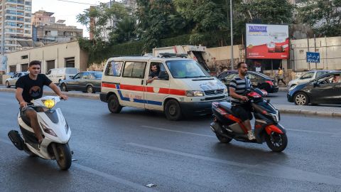 A Lebanese Red Cross ambulance rushes wounded people to a hospital in Beirut on September 17, 2024, after explosions hit locations in several Hezbollah strongholds around the country amid ongoing cross-border tensions between Israel and Hezbollah fighters. Hundreds of people were wounded when Hezbollah members' paging devices exploded simultaneously across Lebanon on September 17, in what a source close to the militant movement said was an "Israeli breach" of its communications. (Photo by Ibrahim AMRO / AFP) (Photo by IBRAHIM AMRO/AFP via Getty Images)