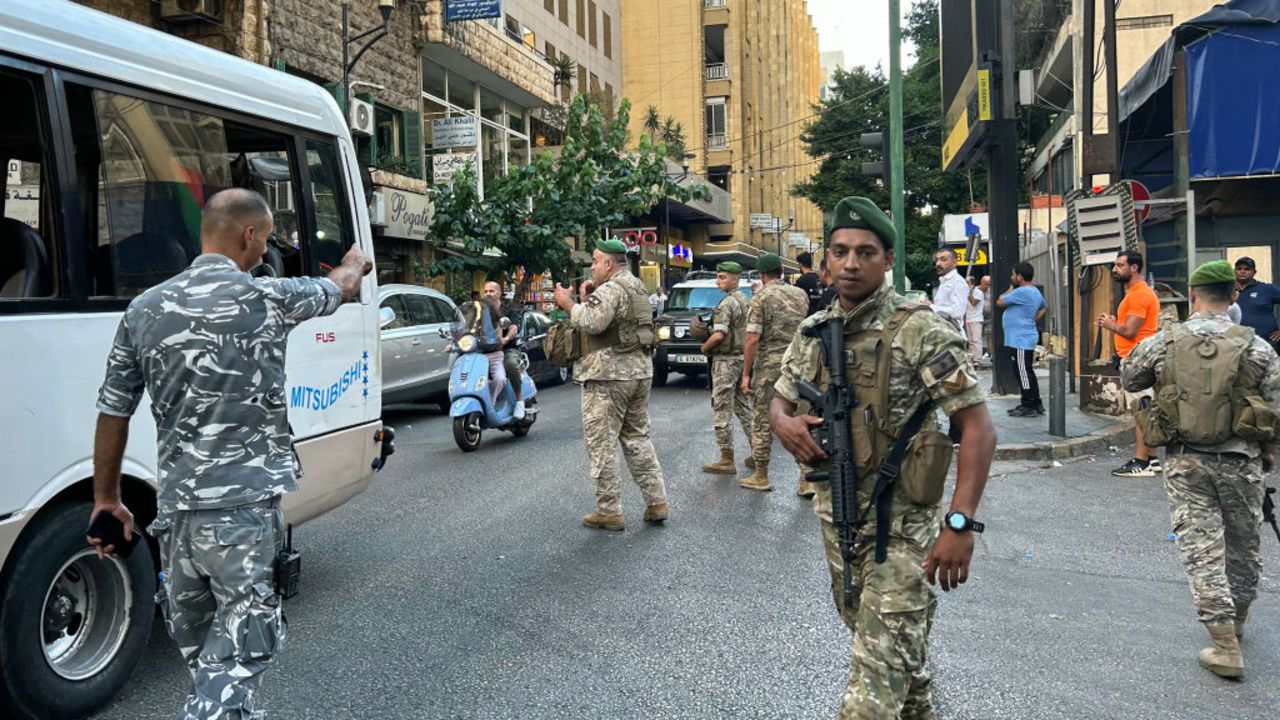 Lebanese army soldiers stand guard in Beirut on September 17, 2024, after explosions hit locations in several Hezbollah strongholds around Lebanon amid ongoing cross-border tensions between Israel and Hezbollah fighters. Hundreds of people were wounded when Hezbollah ' paging devices exploded simultaneously across Lebanon on September 17, in what a source close to the militant movement said was an "Israeli breach" of its communications. (Photo by Anwar AMRO / AFP) (Photo by ANWAR AMRO/AFP via Getty Images)