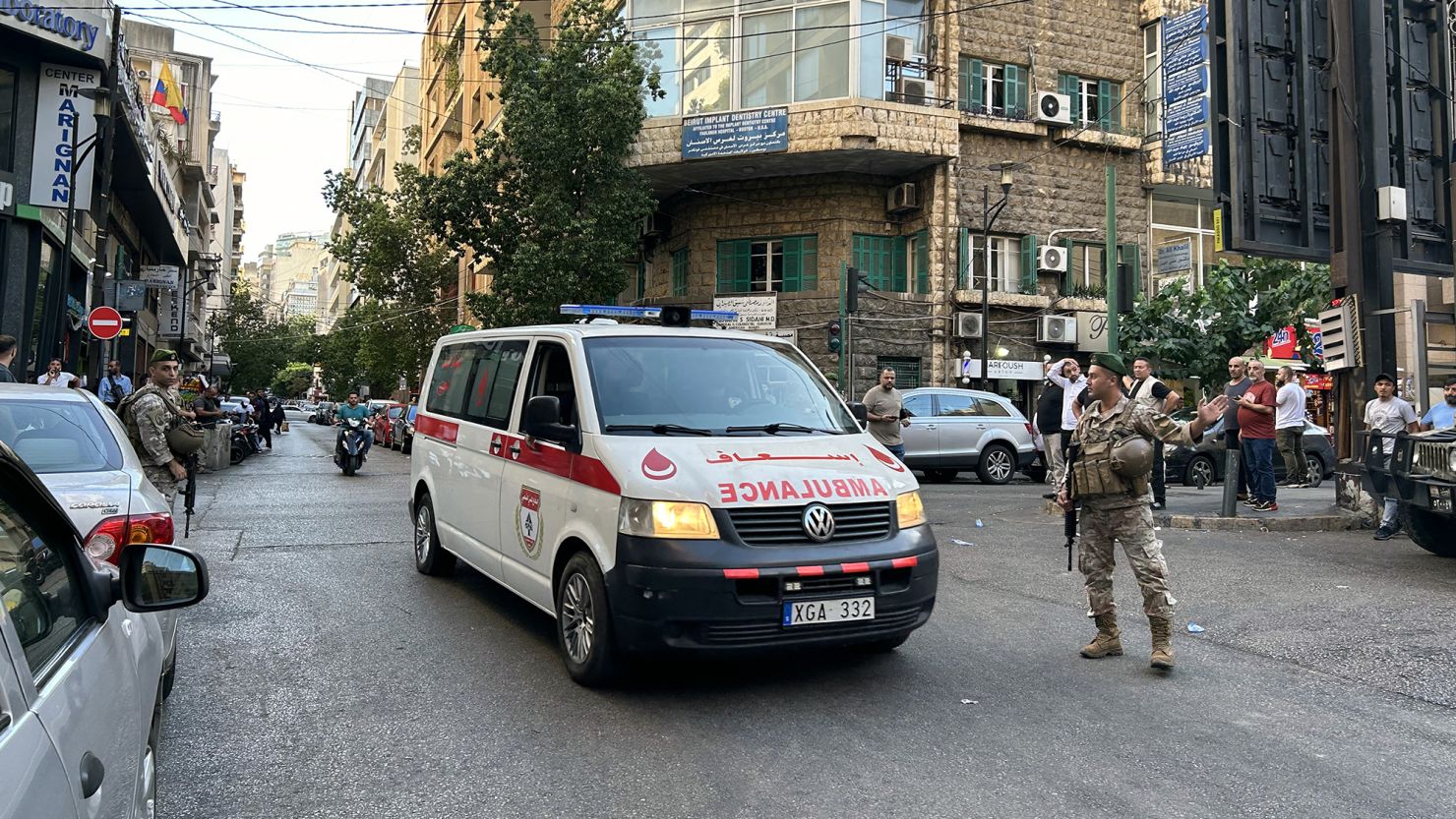 An ambulance rushes wounded people to a hospital in Beirut on September 17, 2024, after explosions hit locations in several Hezbollah strongholds around Lebanon amid ongoing cross-border tensions between Israel and Hezbollah fighters.