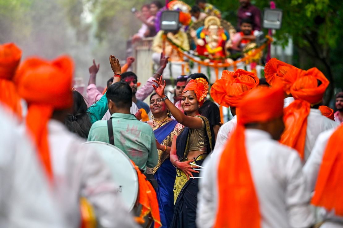 Hindu devotees chant as they carry a statue of the Hindu God Ganesha on the last day of the Ganesh Chaturthi festival, in New Delhi, India on September 17, 2024.