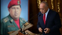 Venezuela's Interior Minister Diosdado Cabello speaks next to a painting of the late Venezuelan President Hugo Chavez during a session at the National Assembly in Caracas on September 17, 2024. Venezuela said Tuesday it had arrested a fourth US citizen over what it claims was a plot to assassinate President Nicolas Maduro in the aftermath of elections the opposition claims he stole. (Photo by Federico PARRA / AFP) (Photo by FEDERICO PARRA/AFP via Getty Images)