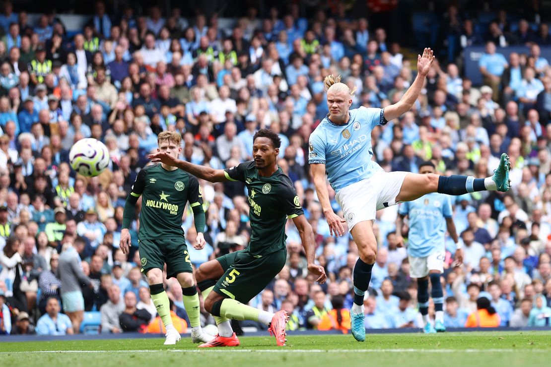 Erling Haaland scores his team's first goal  against Brentford.