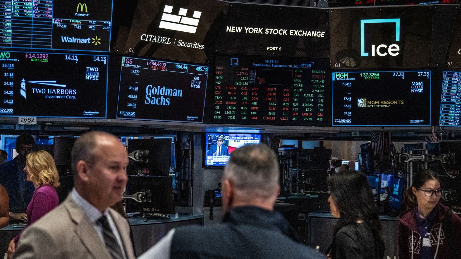 Traders work on the floor of the New York Stock Exchange on September 18, 2024 in New York City.