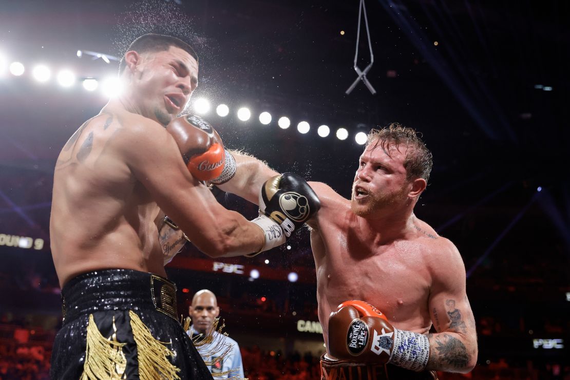 LAS VEGAS, NEVADA - SEPTEMBER 14: WBC/WBA/WBO super middleweight champion Canelo Alvarez (R) punches Edgar Berlanga during the ninth round of a title fight at T-Mobile Arena on September 14, 2024 in Las Vegas, Nevada. (Photo by Steve Marcus/Getty Images)