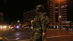 Ecuadorian soldiers patrol a street before a national scheduled eight-hour blackout in Quito on September 18, 2024. Ecuador will be in darkness on Wednesday night due to a scheduled eight-hour blackout for transmission system maintenance, in the midst of a power crisis resulting from the worst drought in 60 years. (Photo by Galo Paguay / AFP) (Photo by GALO PAGUAY/AFP via Getty Images)