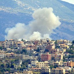 TOPSHOT - Smoke billows from the site of an Israeli airstrike in the southern Lebanese village of Khiam near the border on September 19, 2024. Lebanon's Hezbollah has traded near-daily fire with Israeli forces in support of ally Hamas since the Palestinian militant group's October 7 attack triggered war in the Gaza Strip, with repeated escalations during more than 11 months of the cross-border violence. (Photo by AFP) (Photo by -/AFP via Getty Images)