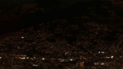 Partial view of the city in darkness during a national programmed rationing of electricity due to maintenance of the transmission system and distribution networks, in Quito on September 18, 2024. Ecuador will be in darkness on Wednesday night due to a scheduled eight-hour blackout in the midst of a power crisis resulting from the worst drought in 60 years. (Photo by Galo Paguay / AFP) (Photo by GALO PAGUAY/AFP via Getty Images)