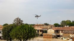 People are evacuated by helicopters of the Italian Air Force during floods in the small village of Traversara, on September 19, 2024. Many inhabitants were caught by the flood are still stuck in their homes sourrounded by water. The strong winds and rains which have swept across central and eastern Europe, killing 24 people, pummeled the Emilia-Romagna and Marche regions, with over 1,000 people evacuated from homes. (Photo by Federico SCOPPA / AFP) (Photo by FEDERICO SCOPPA/AFP via Getty Images)