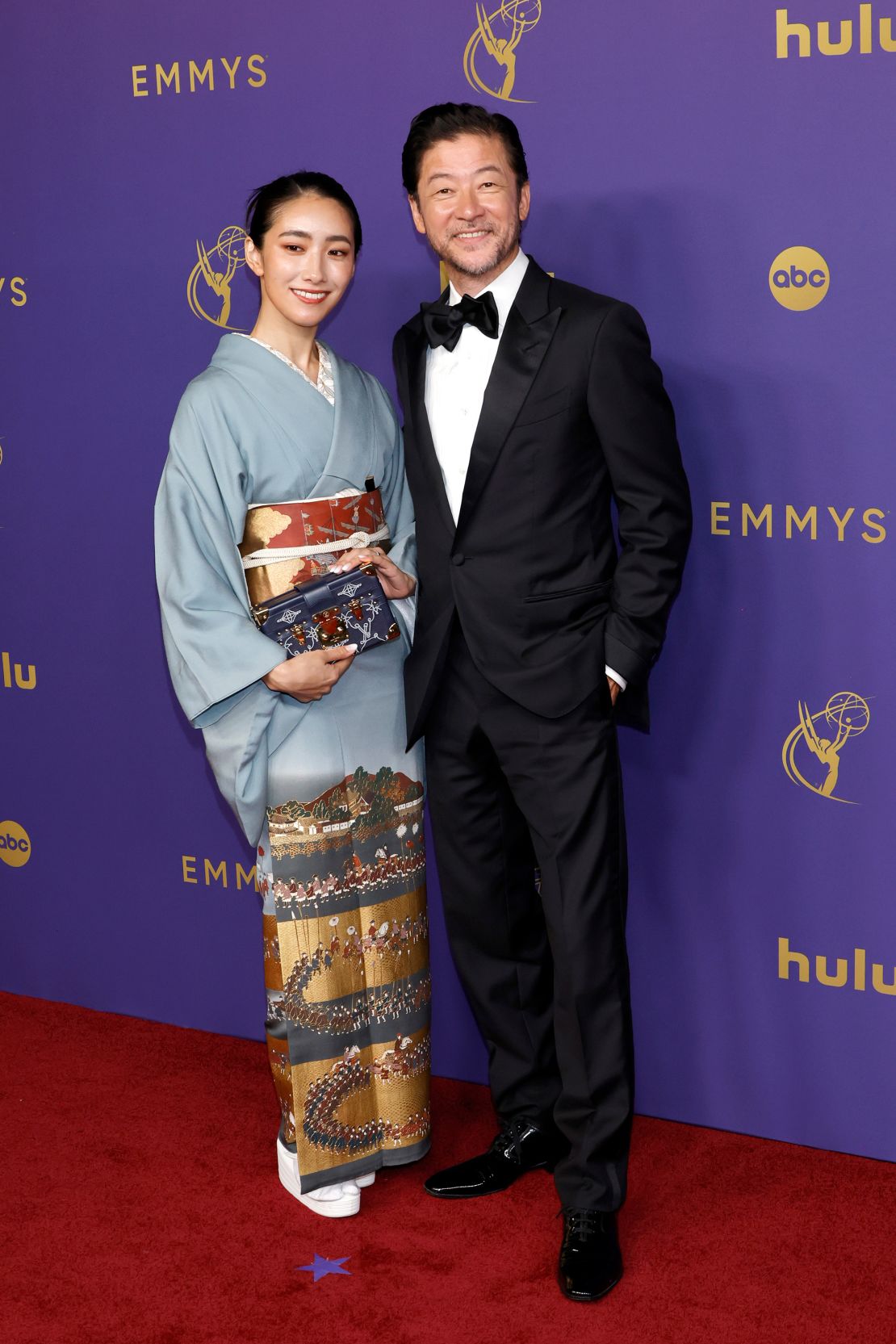 “Shōgun” actor Tadanobu Asano in black-tie attire alongside actress wife Kurumi Nakata, who wowed the red carpet in a kimono featuring gold detailing worthy of a historical Japanese painting..