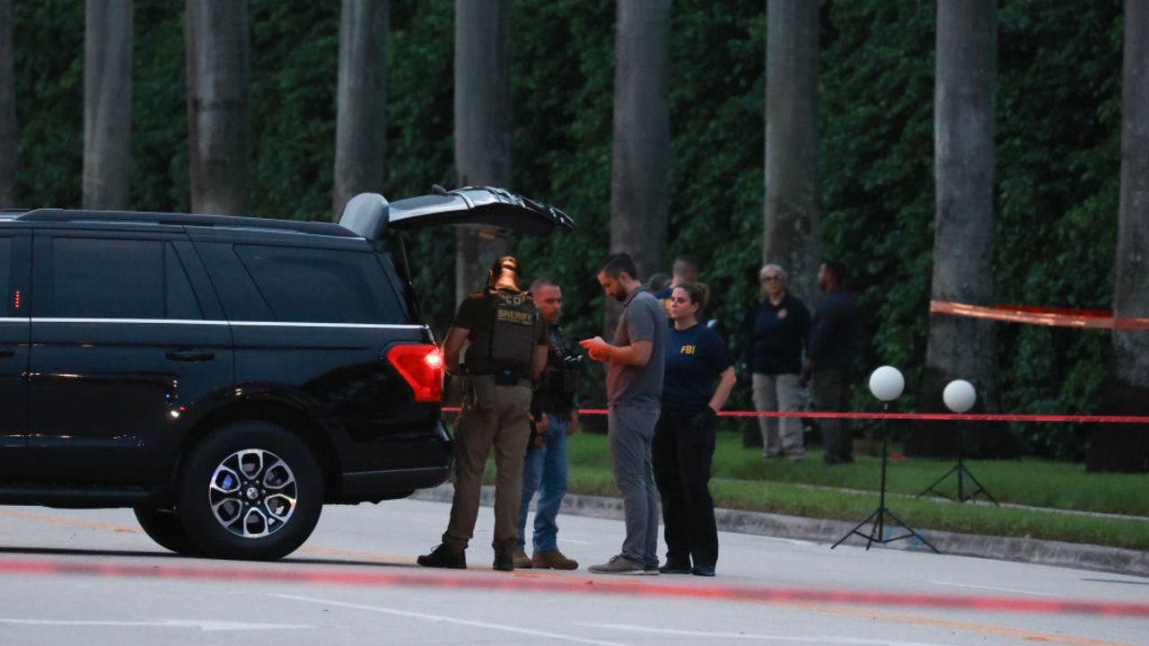 WEST PALM BEACH, FLORIDA - SEPTEMBER 15: Law enforcement personnel investigate the area around Trump International Golf Club after an apparent assassination attempt of former President Donald Trump on September 15, 2024 in West Palm Beach, Florida. The FBI and U.S. Secret Service, along with the Palm Beach County Sheriff's office, are investigating the incident, which the FBI said "appears to be an attempted assassination of former President Trump" while he was golfing at the course. (Photo by Joe Raedle/Getty Images)