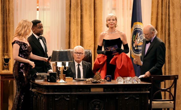 Actors from the show "The West Wing" — from left, Janel Moloney, Dulé Hill, Martin Sheen, Allison Janney and Richard Schiff — reunite to present the Emmy for outstanding drama series.