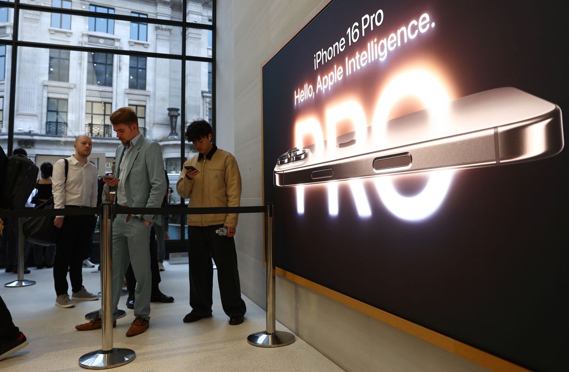 Customers queue at the Apple Store, Regent Street, on September 20, 2024, in London, England. Following Apple's new product announcements, customers can pick up the new iPhone 16, 16 Plus, 16 Pro and 16 Pro Max, Apple Watch Series 10, AirPods 4, AirPods Pro 2 and AirPods Max from UK Apple Stores today.