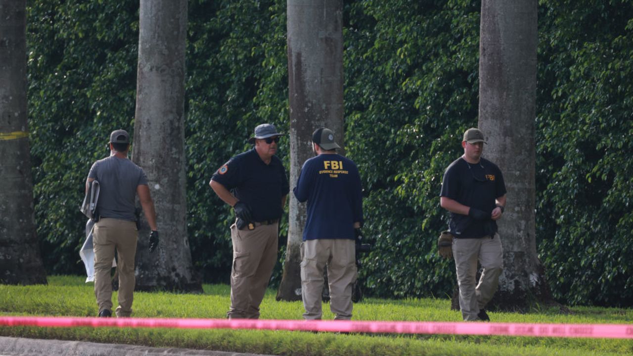 WEST PALM BEACH, FLORIDA - SEPTEMBER 16: Law enforcement personnel continue to investigate the area around Trump International Golf Club after an apparent assassination attempt on former President Donald Trump on September 16, 2024 in West Palm Beach, Florida. The FBI and U.S. Secret Service, along with the Palm Beach County Sheriff's office, are investigating the incident, which the FBI said "appears to be an attempted assassination of former President Trump" while he was golfing at Trump International Golf Club.  (Photo by Joe Raedle/Getty Images)