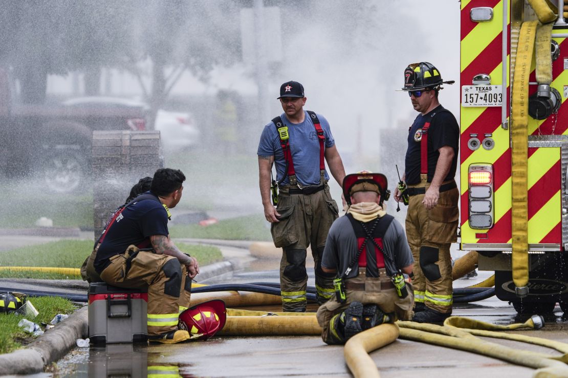 LA PORTE, TEXAS - SEPTEMBER 16: Firefighters take a break from battling a fire at a pipeline carrying liquified natural gas near Spencer Highway and Summerton on Monday, Sept. 16, 2024 in La Porte. The fire caused road closures and shelter-in-place advisories Monday afternoon in the area, with evacuations to homes and businesses within a half mile from the fire site. (Brett Coomer/Houston Chronicle via Getty Images)