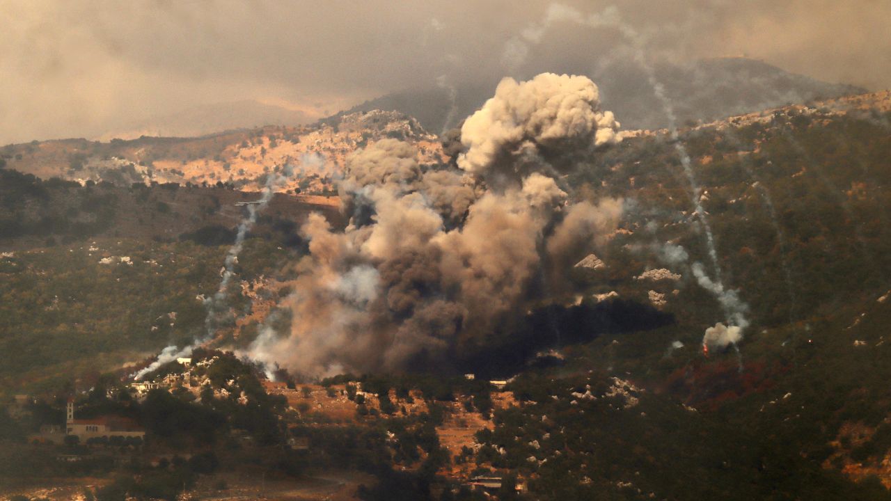 TOPSHOT - Smoke billows from the site of an Israeli strike that targeted the Jabal Al-Rehan area in the southern Lebanese Jezzine district on September 21, 2024. The Israeli military announced on September 21 that it was carrying out new air strikes against Hezbollah targets in Lebanon, without offering details. (Photo by Rabih DAHER / AFP) (Photo by RABIH DAHER/AFP via Getty Images)