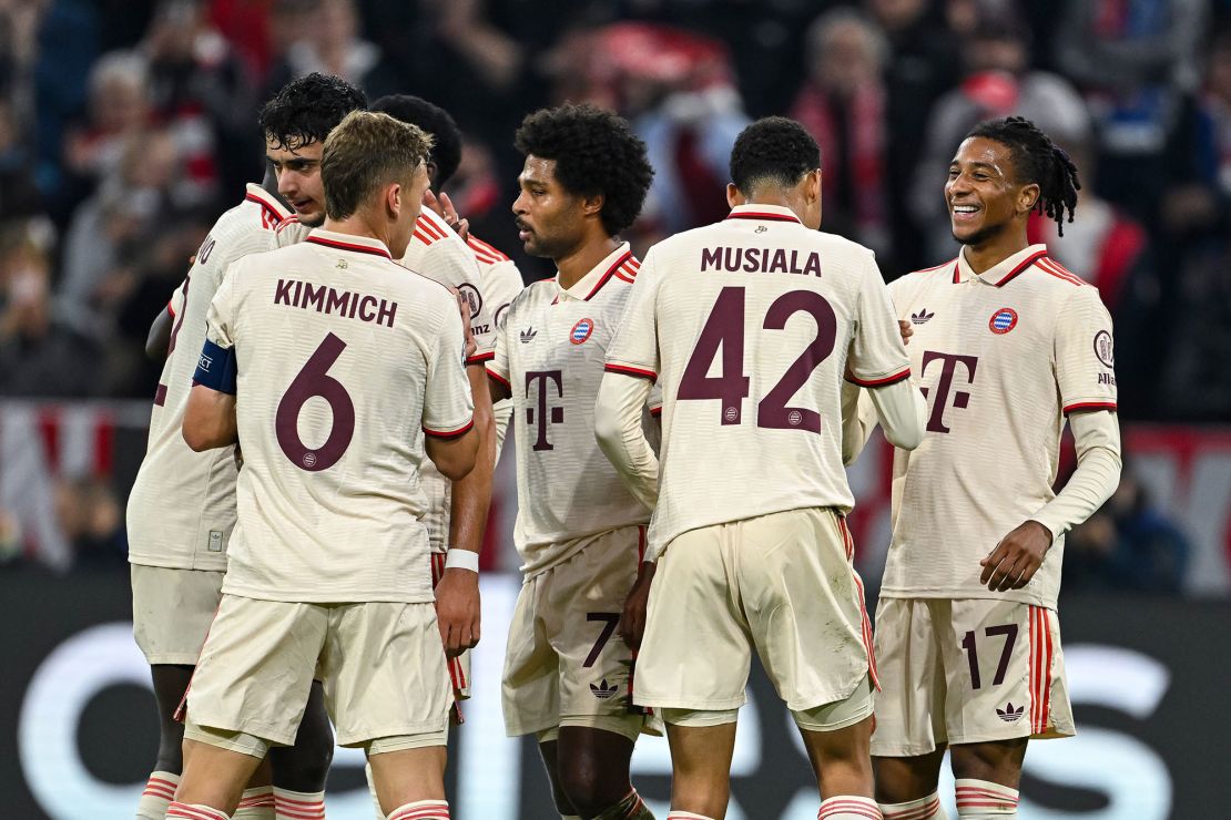 FC Bayern Munich players celebrate Olise (far right) scoring his team’s fifth goal against Dinamo Zagreb.