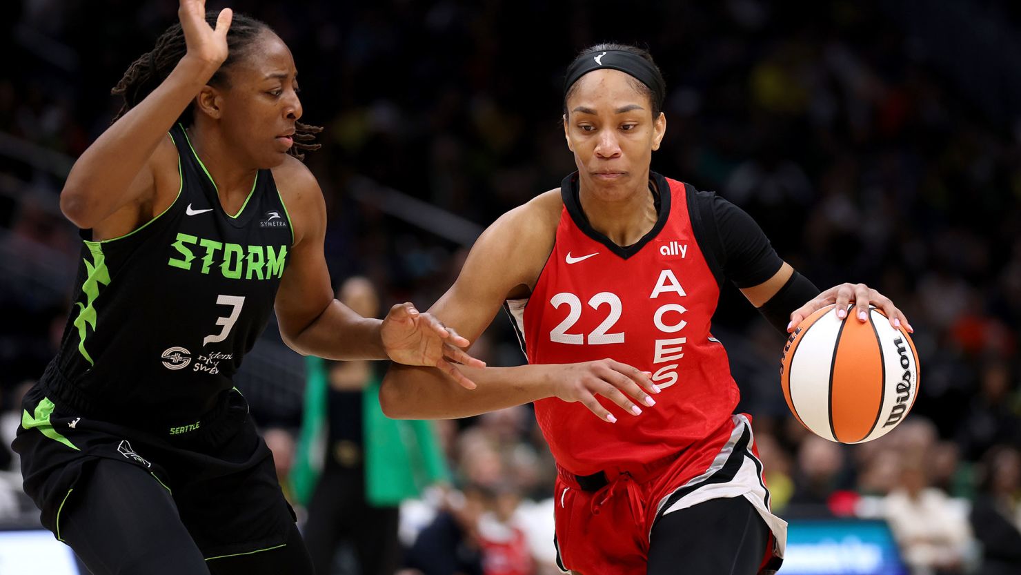 Las Vegas Aces superstar A'ja Wilson drives to the hoop against Nneka Ogwumike in the third quarter at Climate Pledge Arena.