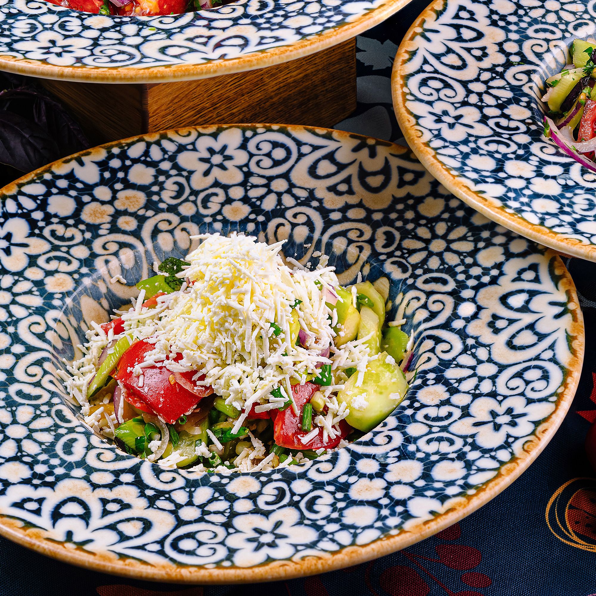 Shopska Salad, Bulgaria’s most famous salad, is crunchy and colorful. It's one of many types of salad served throughout the world, especially when temperatures soar.