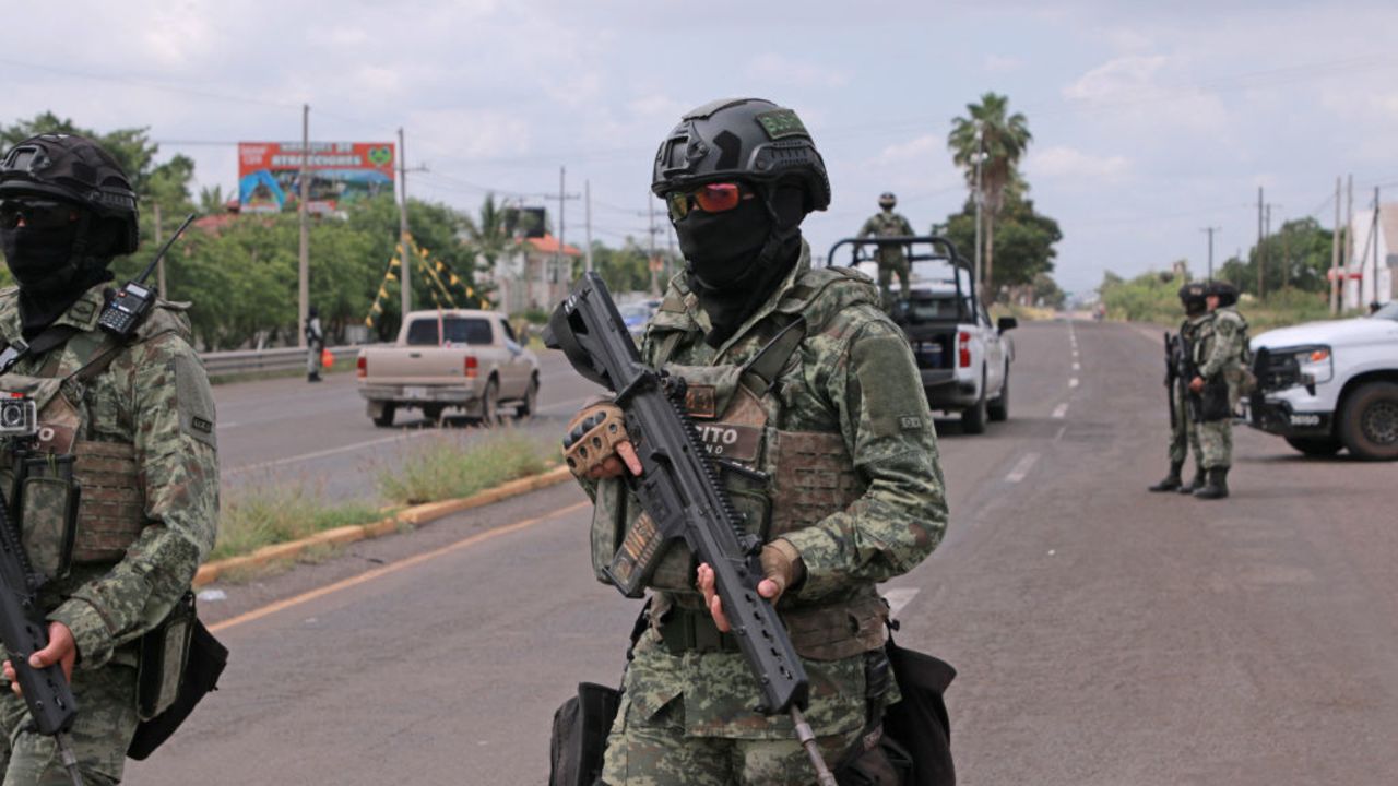 Soldiers of the Mexican Army patrol the streets of Culiacan, Sinaloa State, Mexico, on September 21, 2024. Mexican authorities reported on September 21, shootings in the central streets of Culiacan, capital of the northwestern state of Sinaloa, and blockades on important avenues, in a violent day in which 10 people died, according to news reports. (Photo by Ivan MEDINA / AFP) (Photo by IVAN MEDINA/AFP via Getty Images)