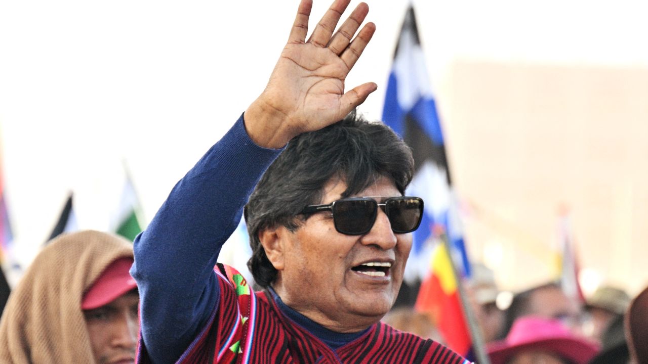 Former Bolivian President Evo Morales waves to supporters during a rally against President Luis Arce in El Alto, Bolivia, September 23, 2024. Clashes between supporters of President Luis Arce and indigenous leader Evo Morales on September 22 near La Paz, left eight people injured, to which President Arce warned that he "will not allow" a "civil war" in Bolivia. (Photo by AIZAR RALDES / AFP) (Photo by AIZAR RALDES/AFP via Getty Images)